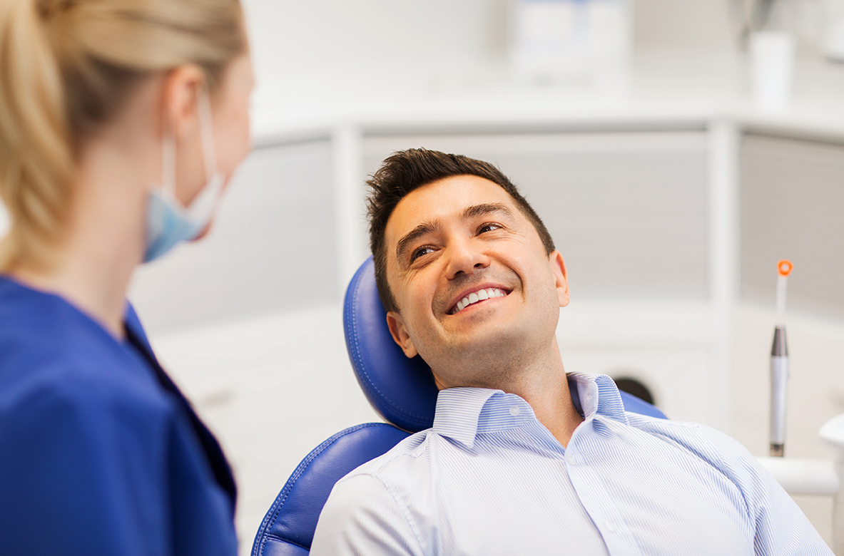 man in dental chair during Same Day Dental Appointment at Medford Main Street Dental P.C.