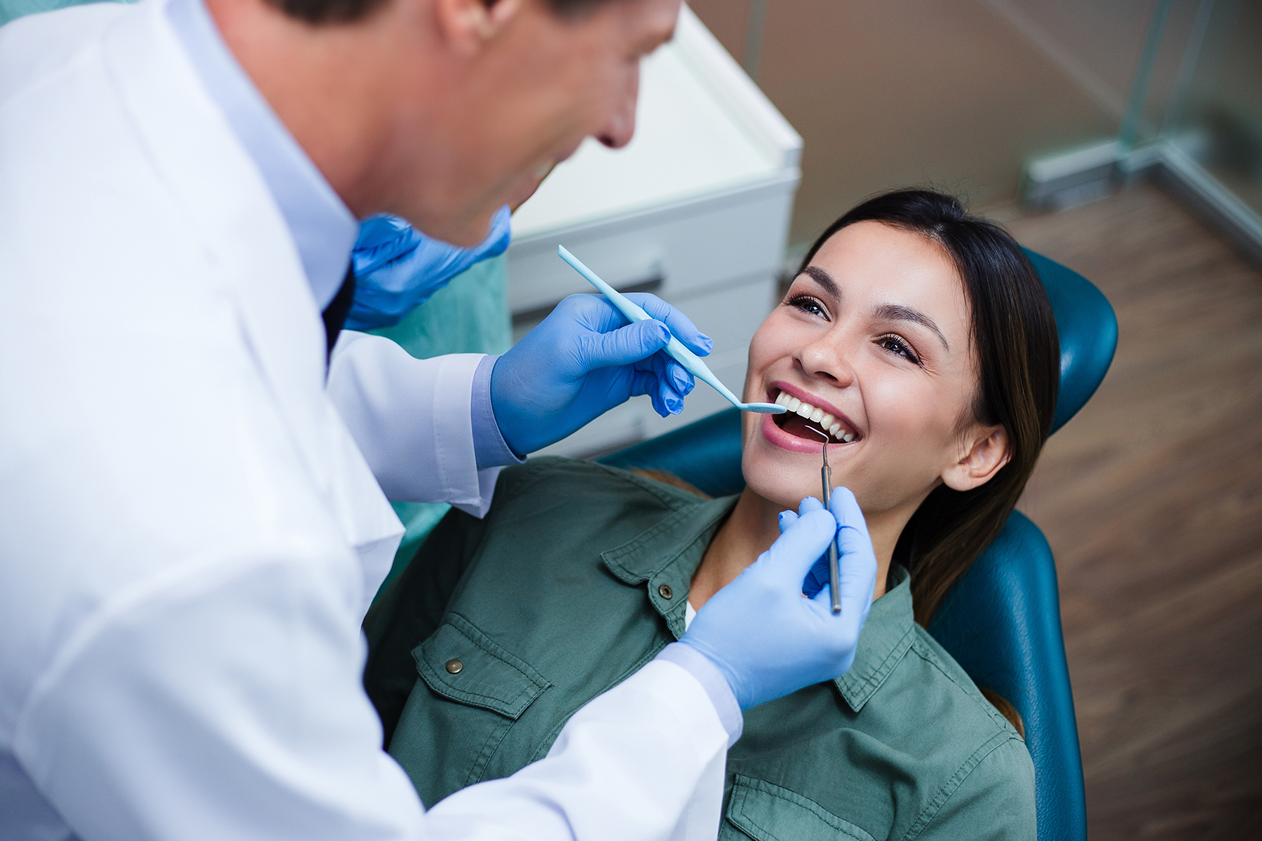 Woman at a preventive dental appointment in Medford, MA