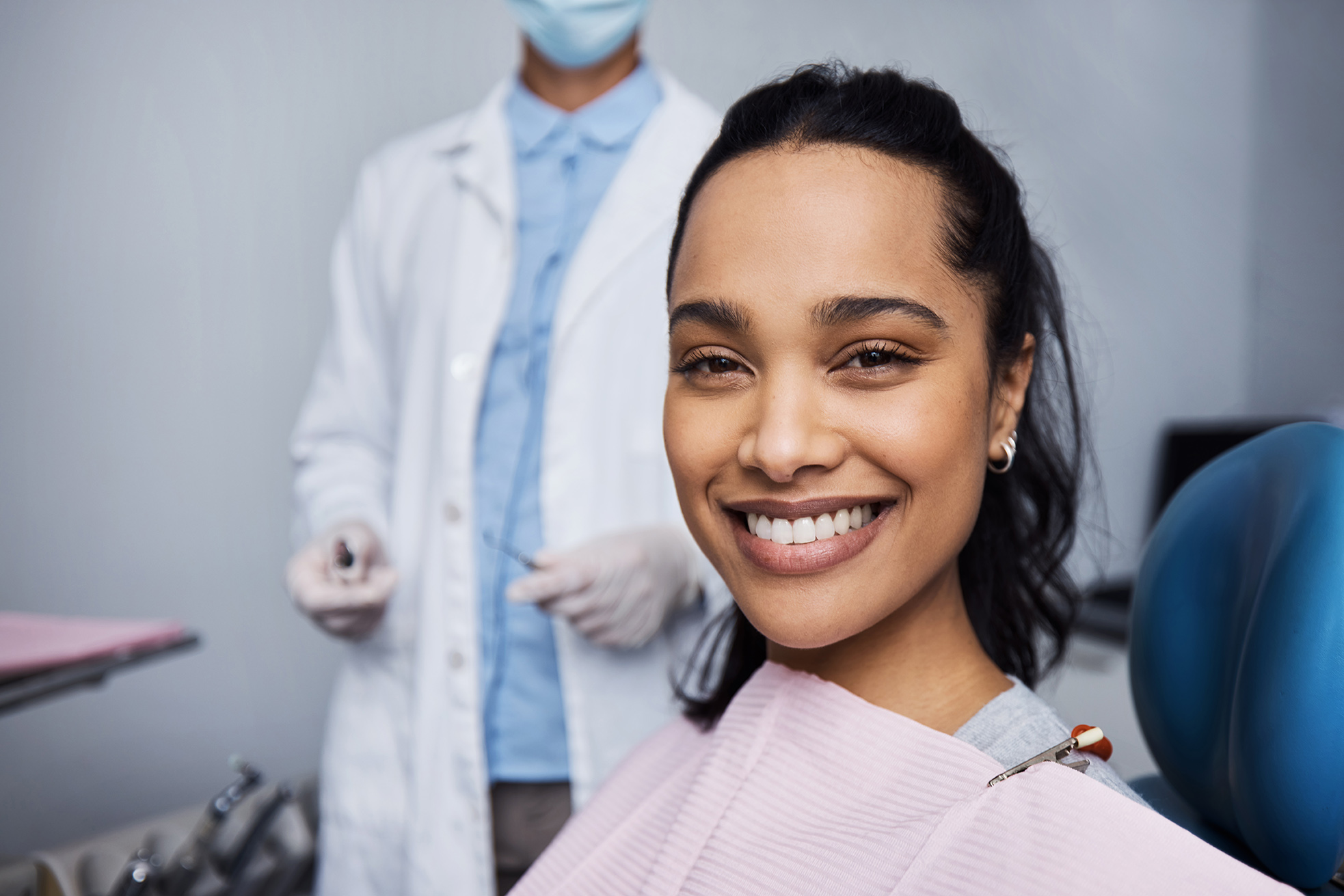 woman smiling during a General Dentistry Appointment at medford main street dental