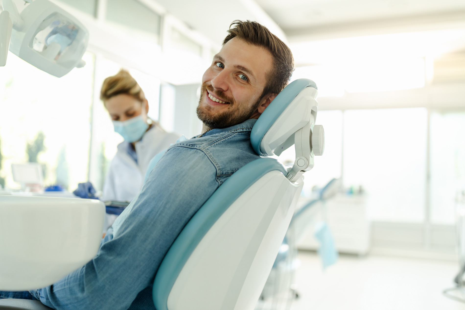 Man at his single tooth implant appointment in Medford