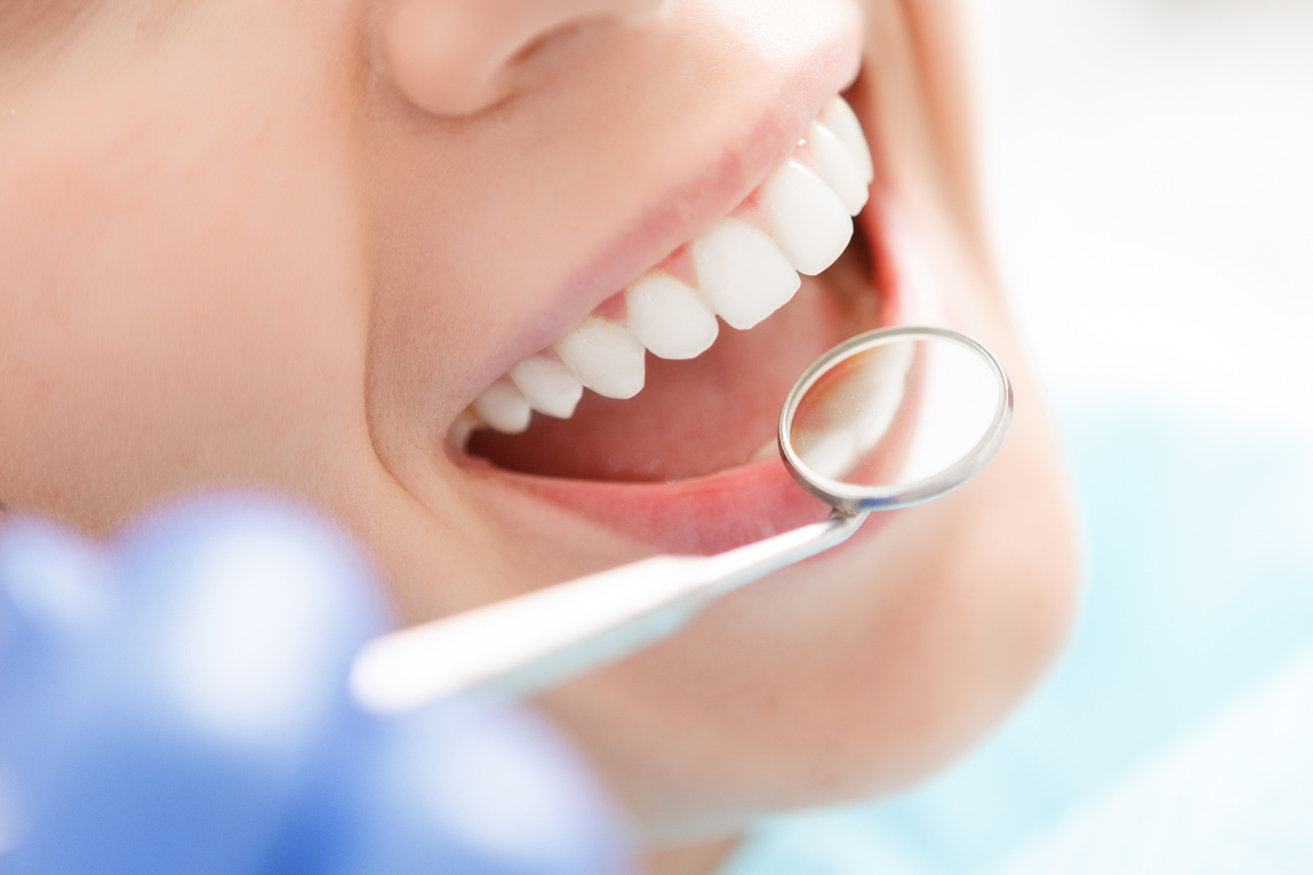 Woman at her implant bridge appointment in Medford